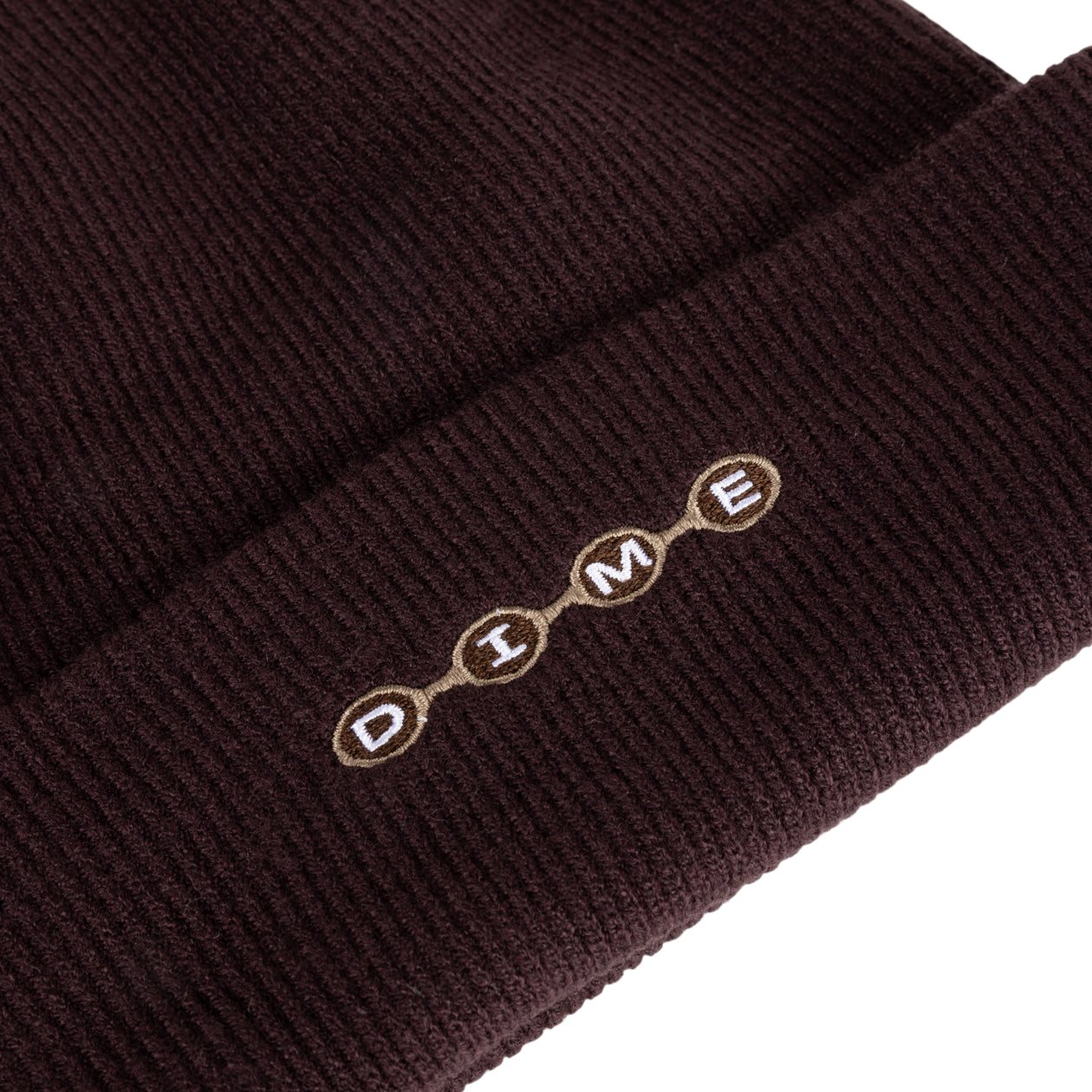 HEADWEAR_FA26D1_SPACEBEANIE_DKBROWN_DETAIL_01-Photoroom.png