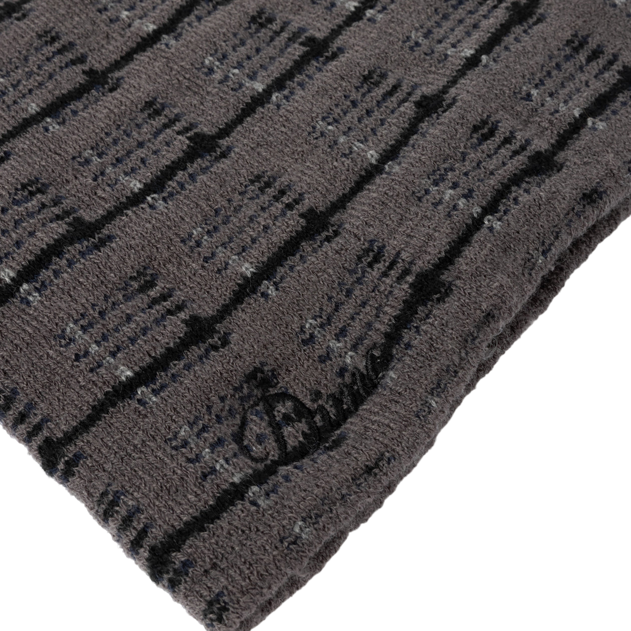 HEADWEAR_FA26D2_PLAIDSKULLY_CHARCOAL_DETAIL-Photoroom.png