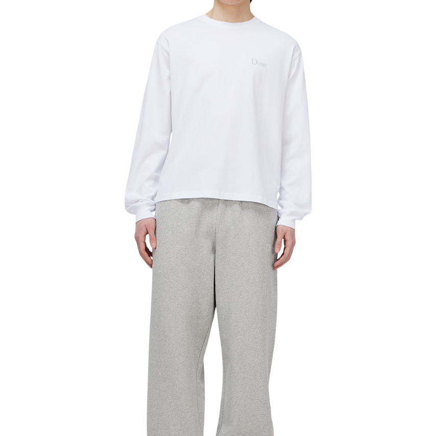 LSSHIRTS_SP26_SMALLOGO_WHITE_MODEL_01-Photoroom.png