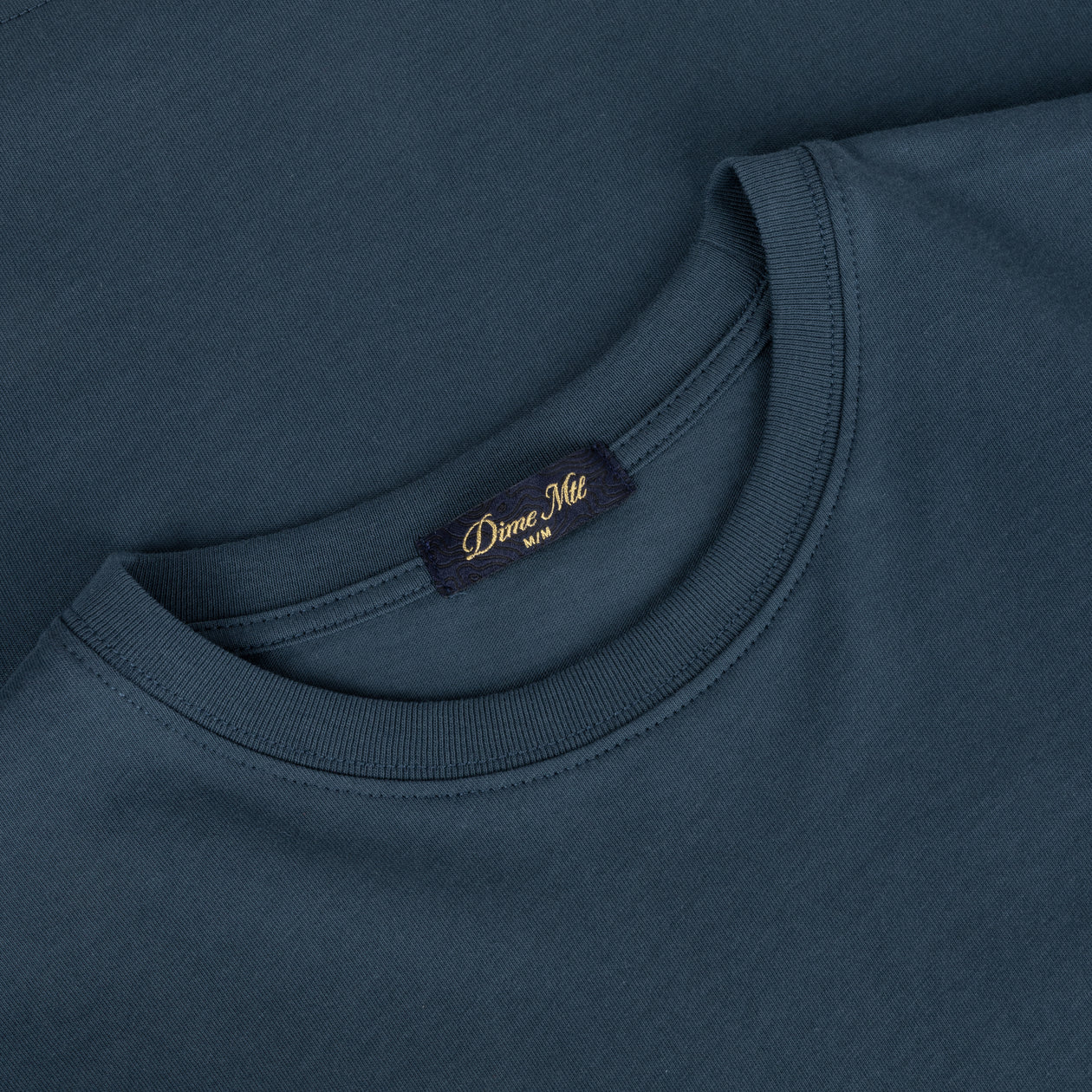 TSHIRTS_FA26D1_NAVY_DETAIL_ee684e36-7bb4-4299-93a3-cfa06a76c795.jpg