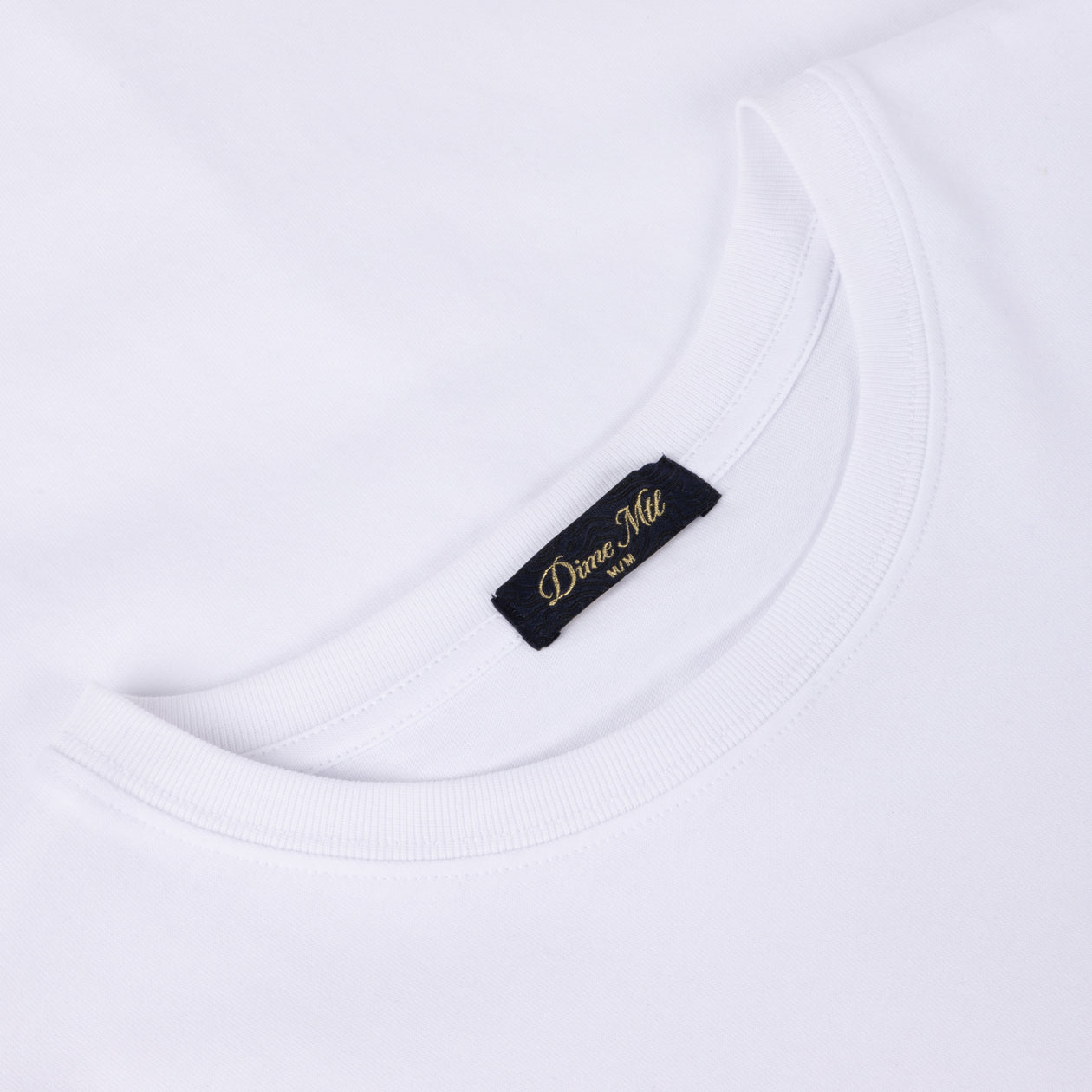 TSHIRTS_FA26D2_WHITE_DETAIL_1f7885ea-907e-4766-a166-fdab45f8ba39.jpg